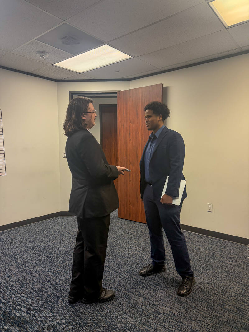 A one-to-one mentoring conversation between two Arsi Global Inc. team members