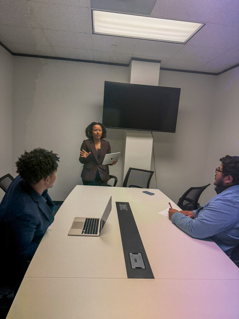A team training session in progress in the Arsi Global Inc. conference room